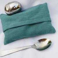 Bouillotte de lin turquoise fermee